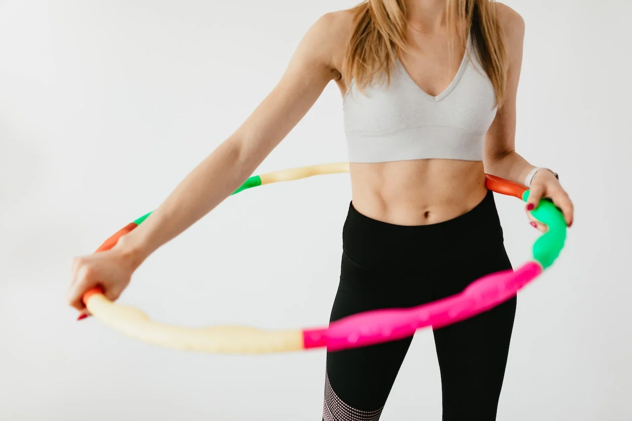 Spin into Fitness: The Muscle Magic of Hula-Hooping